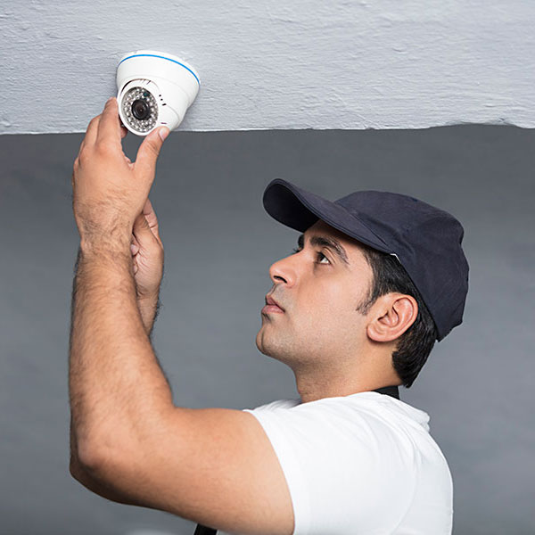 CCTV camera, CCTV camera installing, technician installing CCTV, CCTV security,