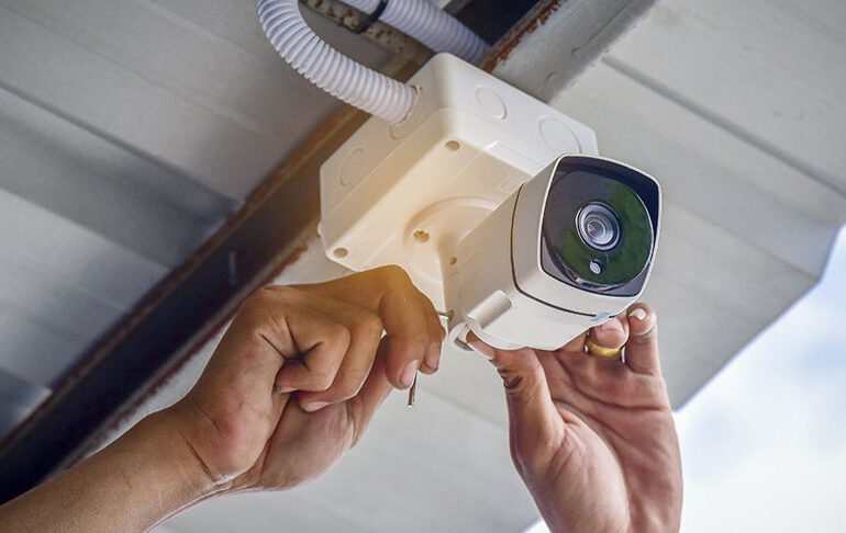 CCTV camera installing near me, technician installing CCTV, CCTV security installations near me.